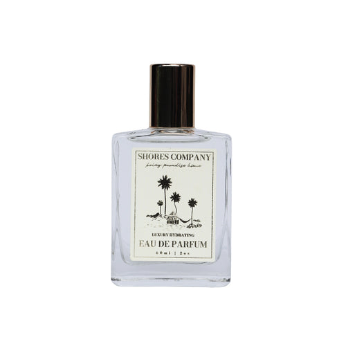 Elegant bottle of Coffea Flores Eau de Parfum, featuring a tropical blend of acai, jasmine, and coconut milk. A refreshing, island-inspired fragrance perfect for daily wear, capturing the essence of sunlit mornings and vibrant island life.