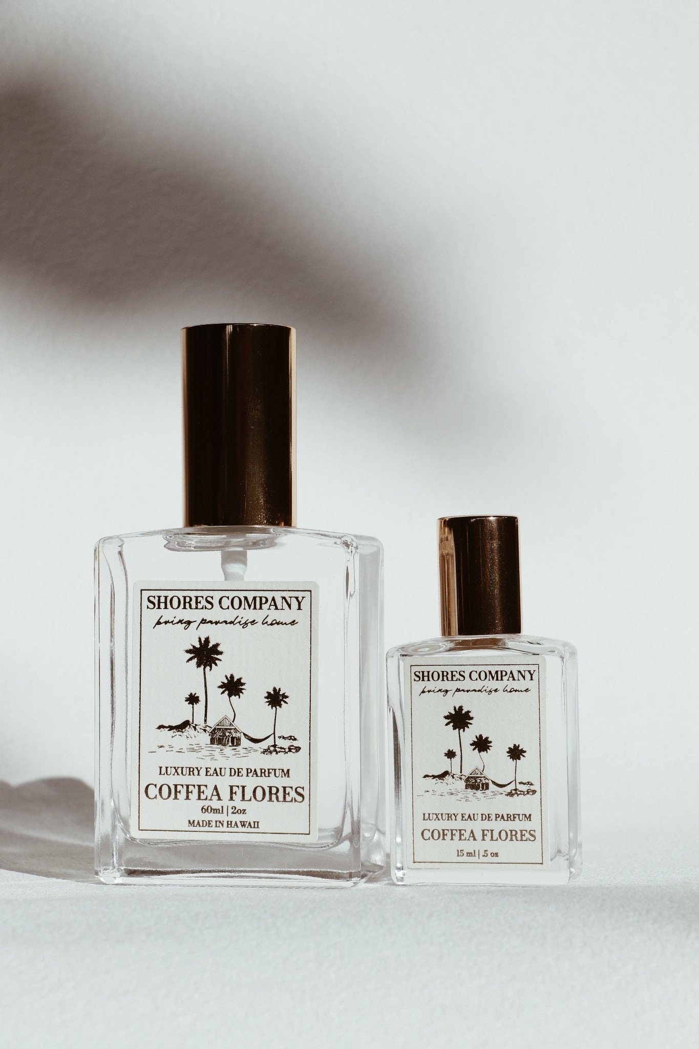 Two Shores Company perfume bottles on a light background