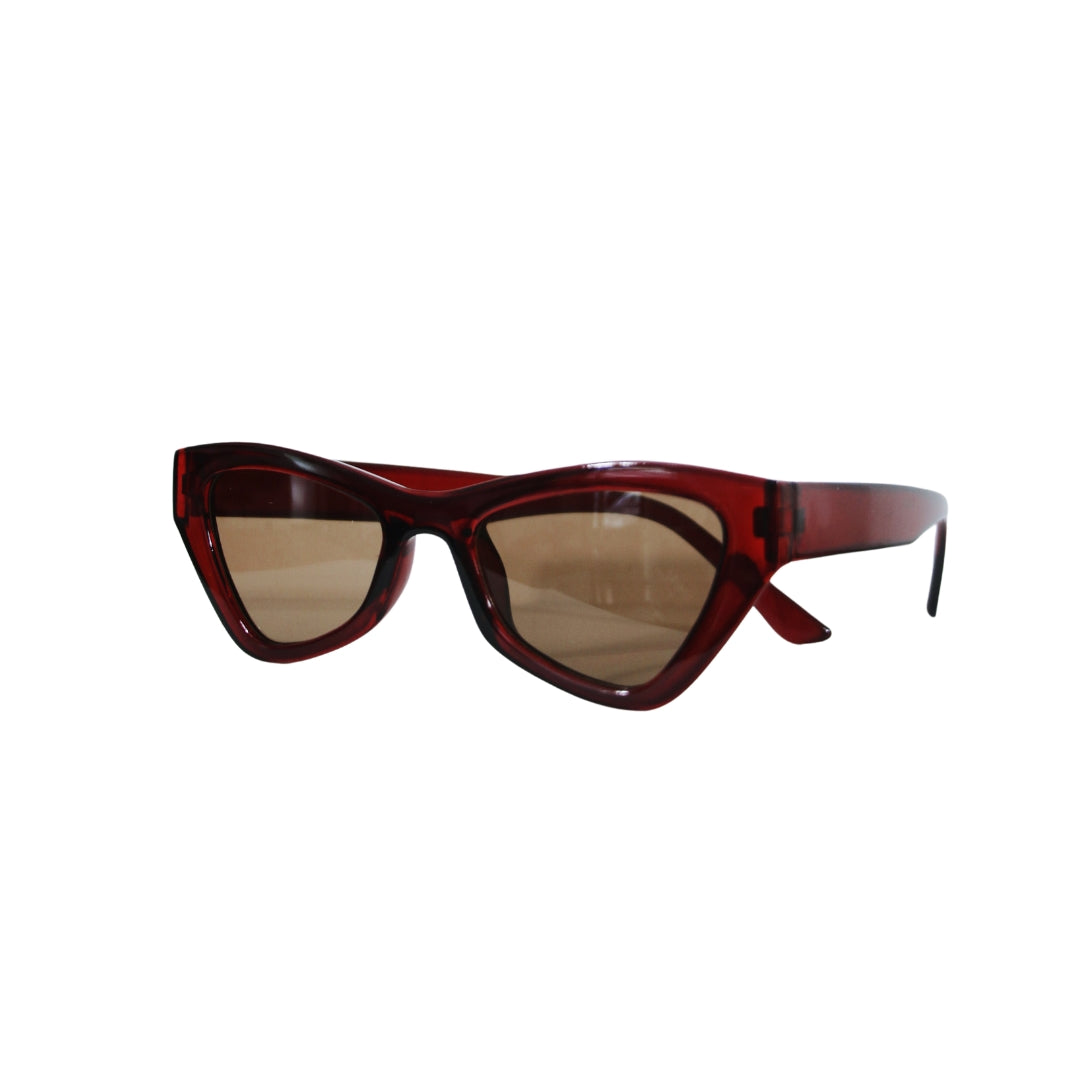 Crimson Wave cat-eye sunglasses in a bold deep crimson color, crafted from M-49 bio acetate and recycled plastic, offering a sleek, stylish design with full UVA/UVB protection