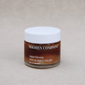 Jar of Shores Company Driftwood Ritual Body Polish on a beige background