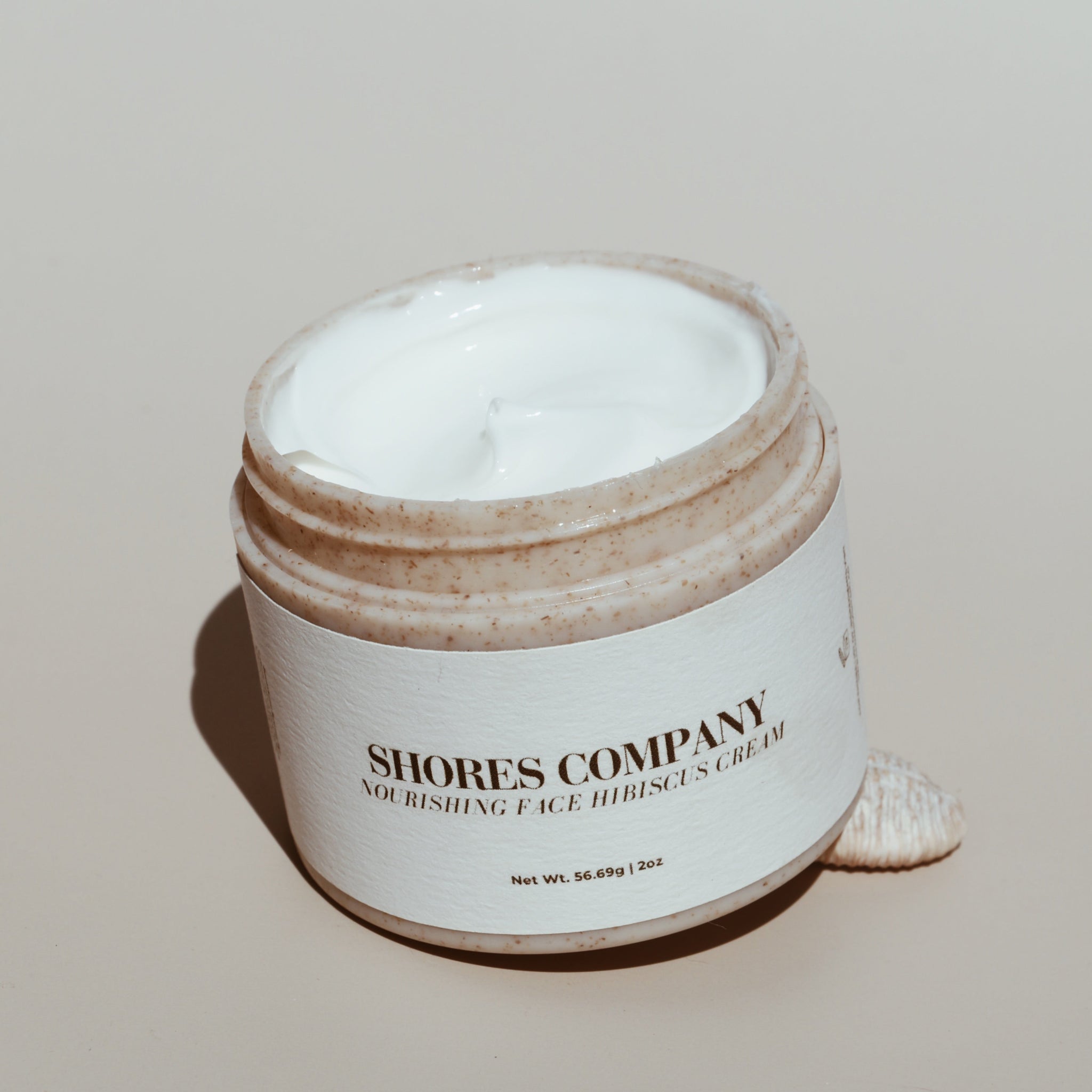 Shores Company Nourishing Hibiscus Face Cream in a minimalist jar, a vitamin-rich moisturizer designed to hydrate and revitalize all skin types.