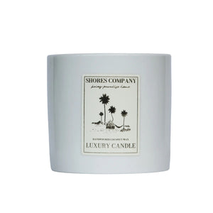 Shores Company 8 oz ceramic candle in the Horizon scent, elegantly crafted in a natural ceramic vessel, evoking coastal serenity and warm island ambiance.