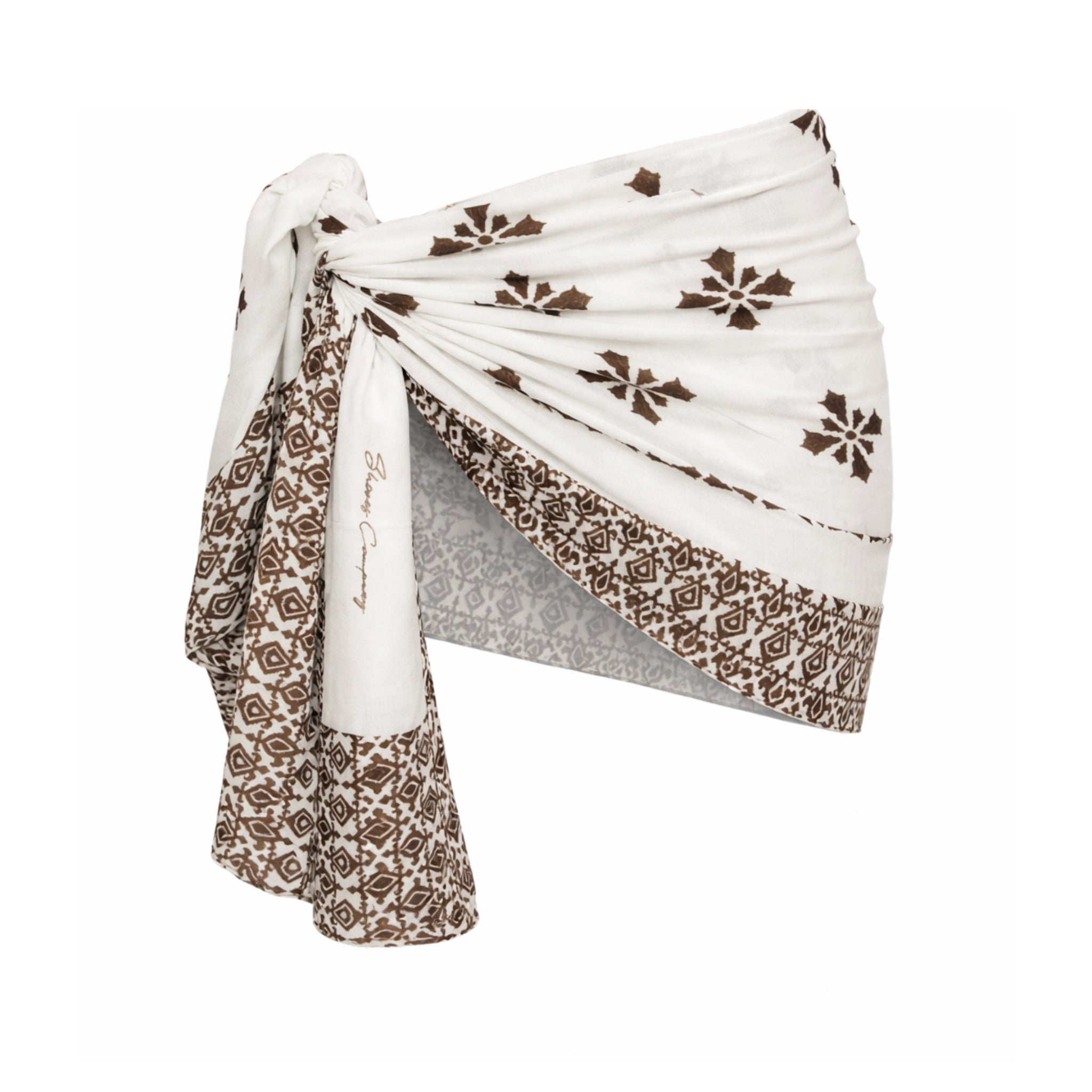 White Isle wrap with brown shell patterns on a white background