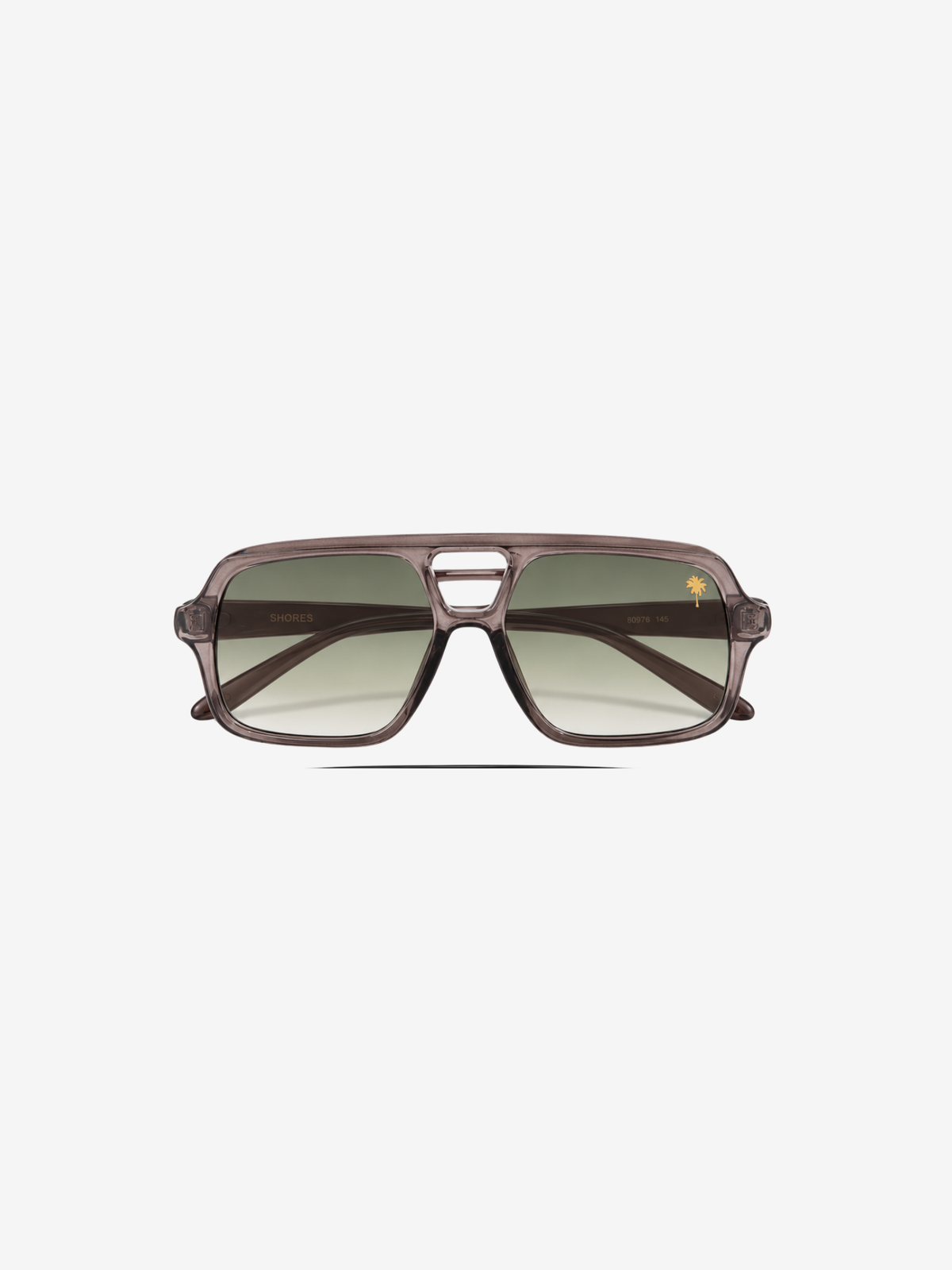 A pair of angular aviator-style sunglasses with a translucent dark brown frame and gradient green-tinted lenses, shown against a plain light gray background.