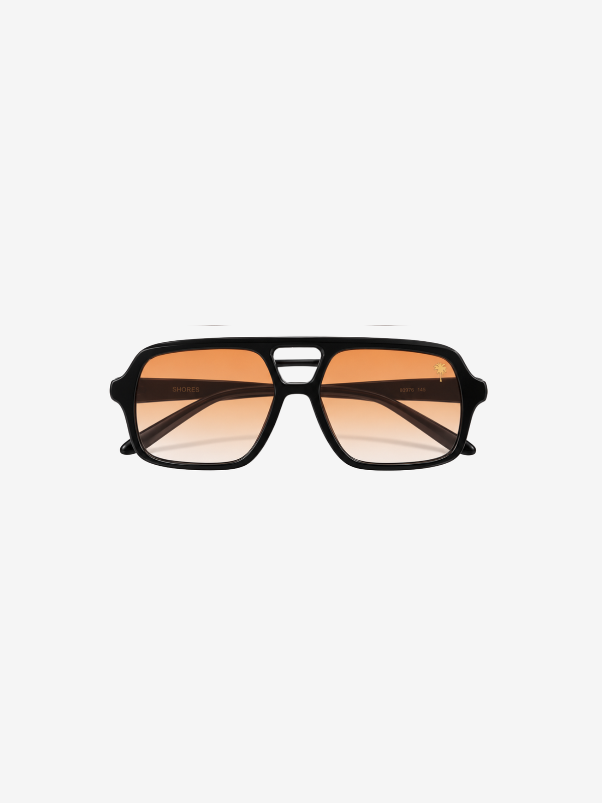 A pair of angular aviator-style sunglasses with a thick black frame and warm orange-tinted lenses, shown against a plain light gray background.