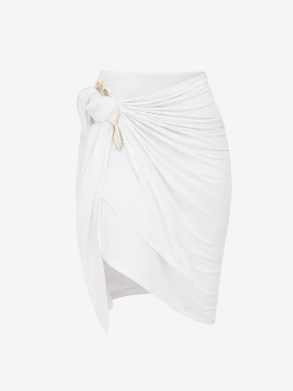 A white wrap skirt with a gathered, draped design and a side knot tied with a shell slice, shown against a plain white background.