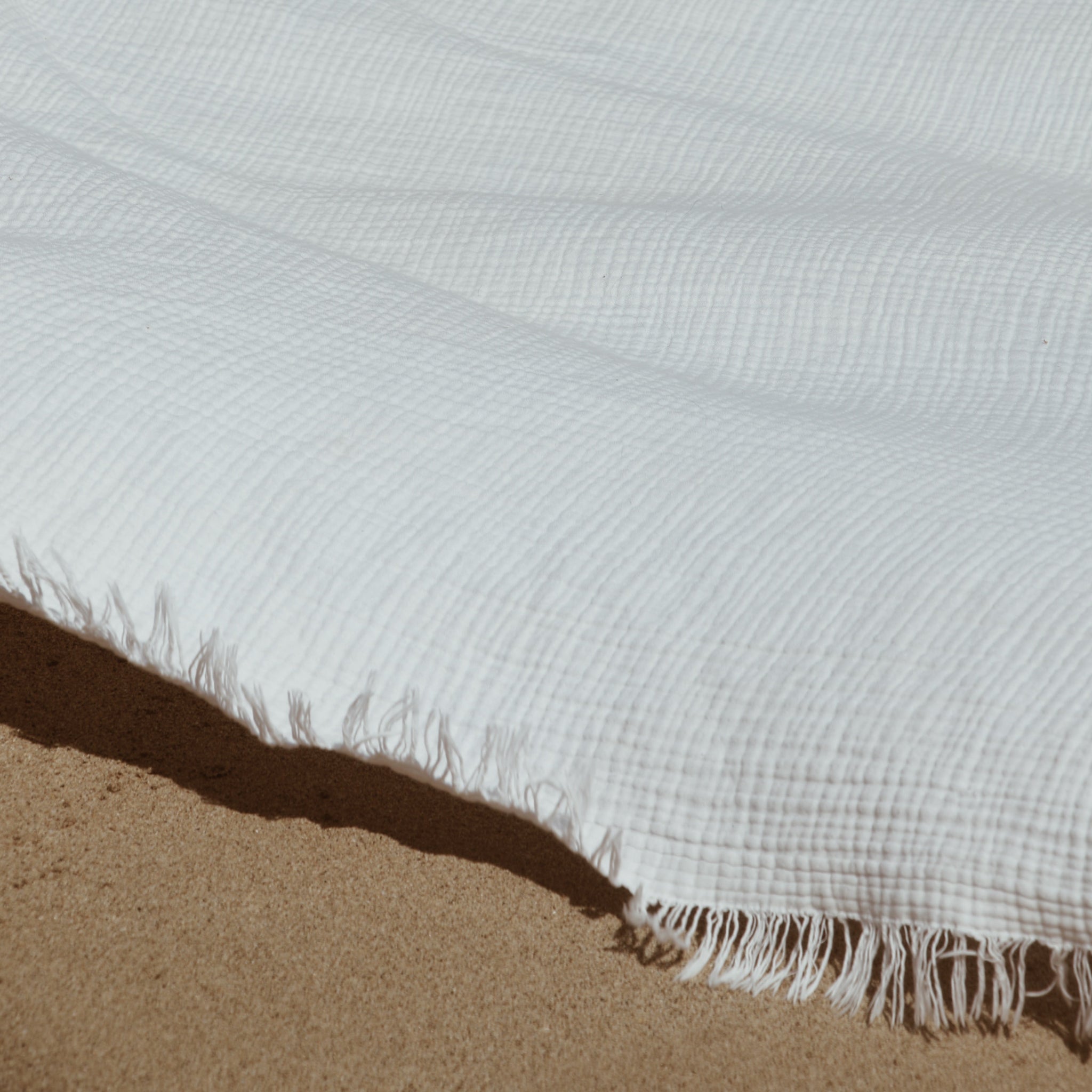 Breezy cotton beach blanket for effortless summer.