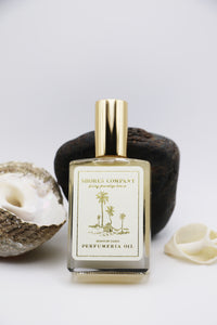 Gentle Windswept Monoi De Tahiti Oil, blending citrus, tuberose, and gardenia notes with moisturizing Monoi oil for a fresh, floral island-inspired aroma