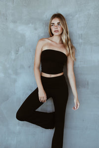 Full standing view of Indah Lounge Pant paired with a bandeau top – effortless and minimal resort wear look.