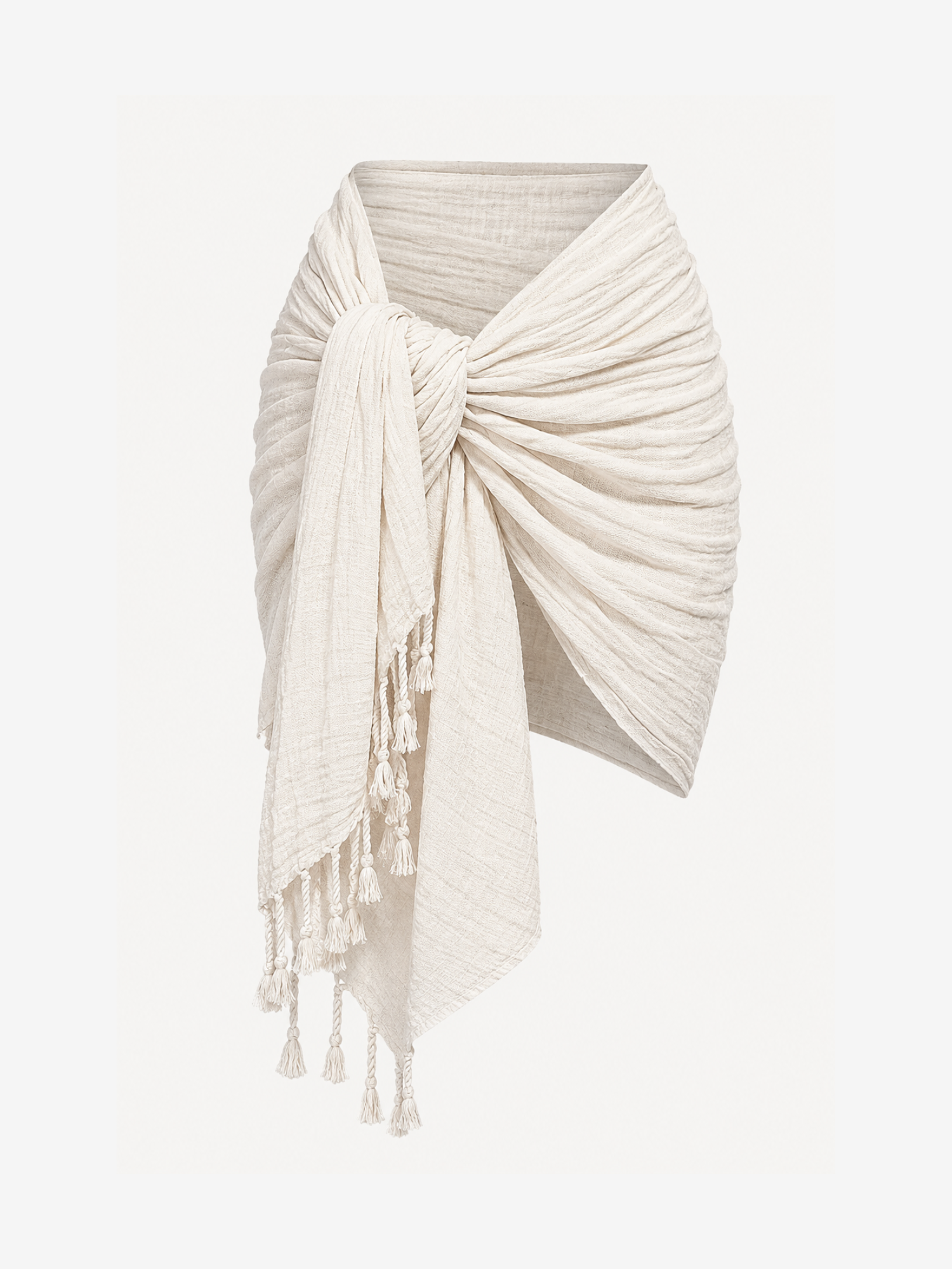 An off-white crinkled cotton wrap scarf with tassels, styled in a knotted wrap-around fashion against a solid off-white background.