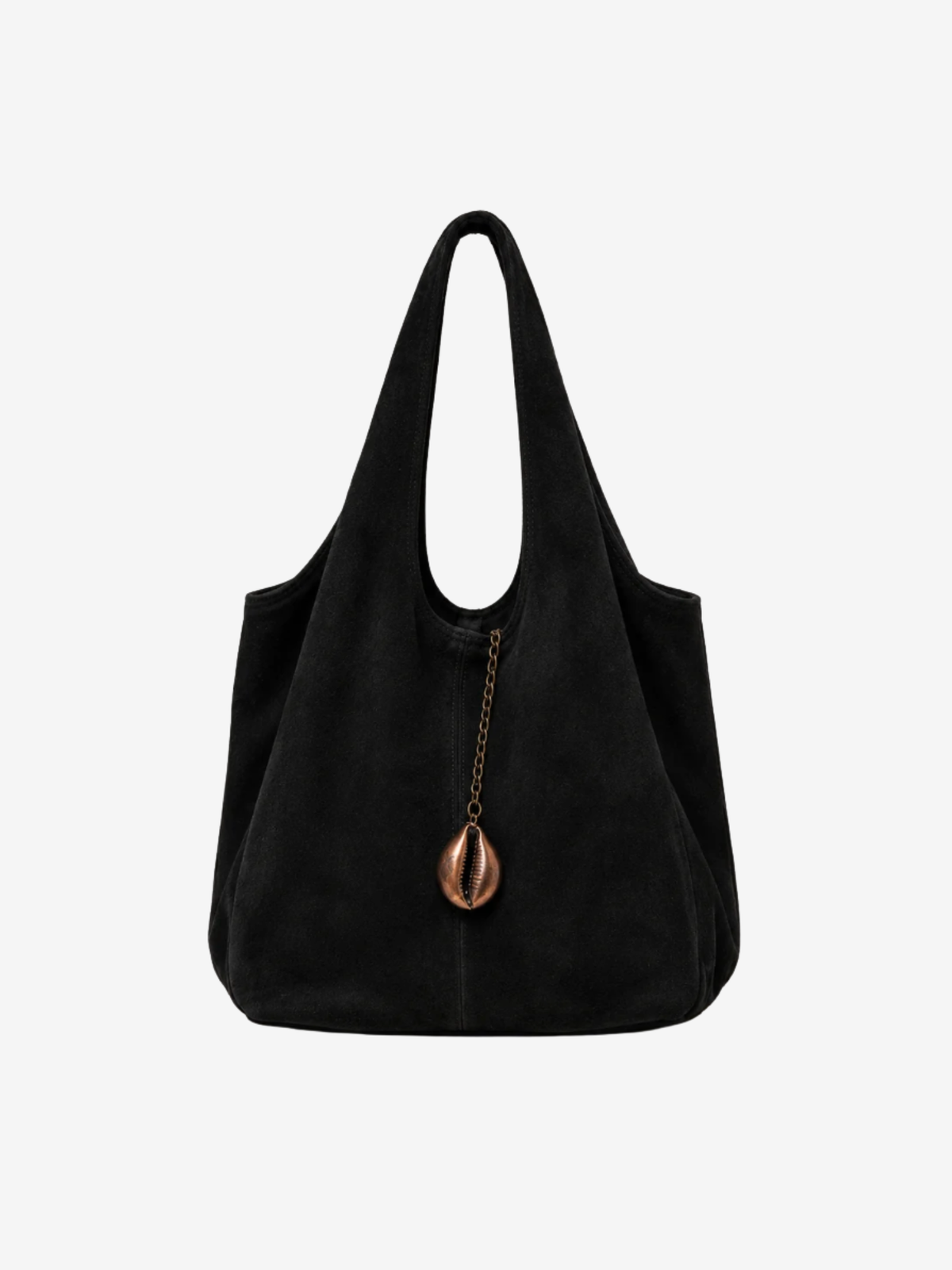 A black suede hobo-style shoulder bag with a single long strap and a decorative cowrie charm hanging from a chain at the center front, shown on a plain light gray background.