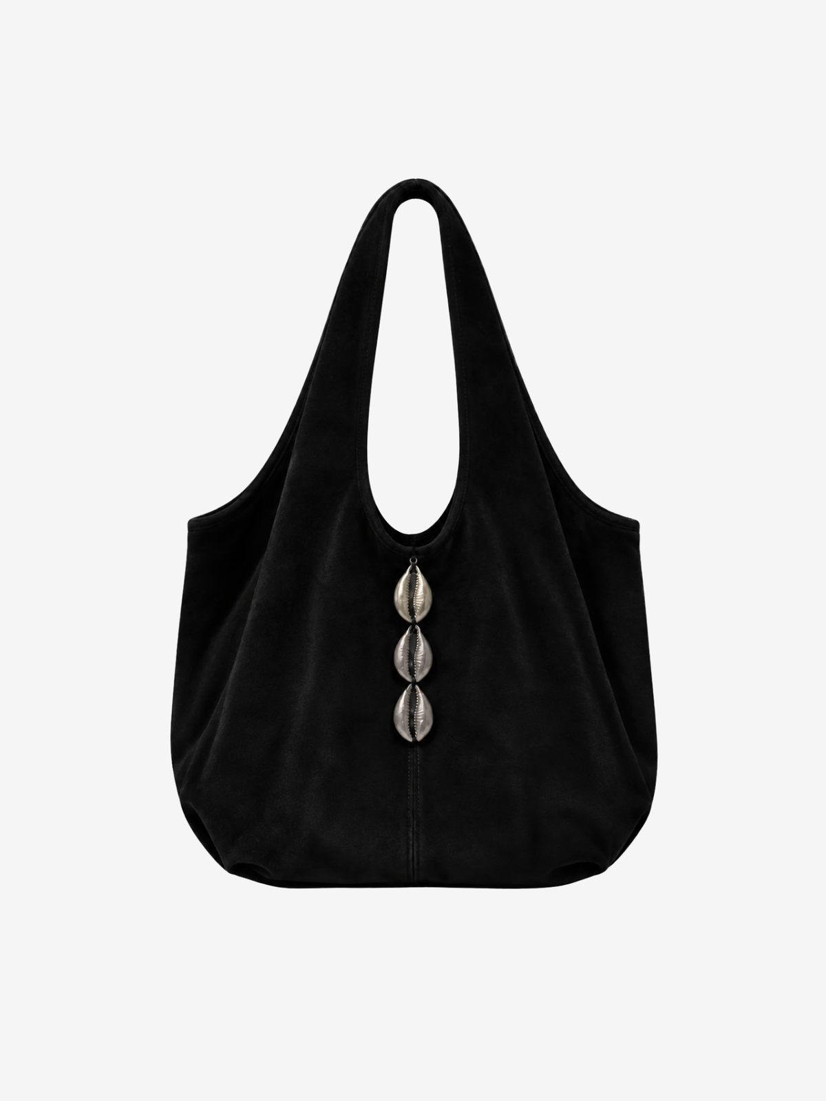 A black suede slouchy shoulder bag with three silver cowrie shell charms hanging vertically on the front, set against a plain light gray background.
