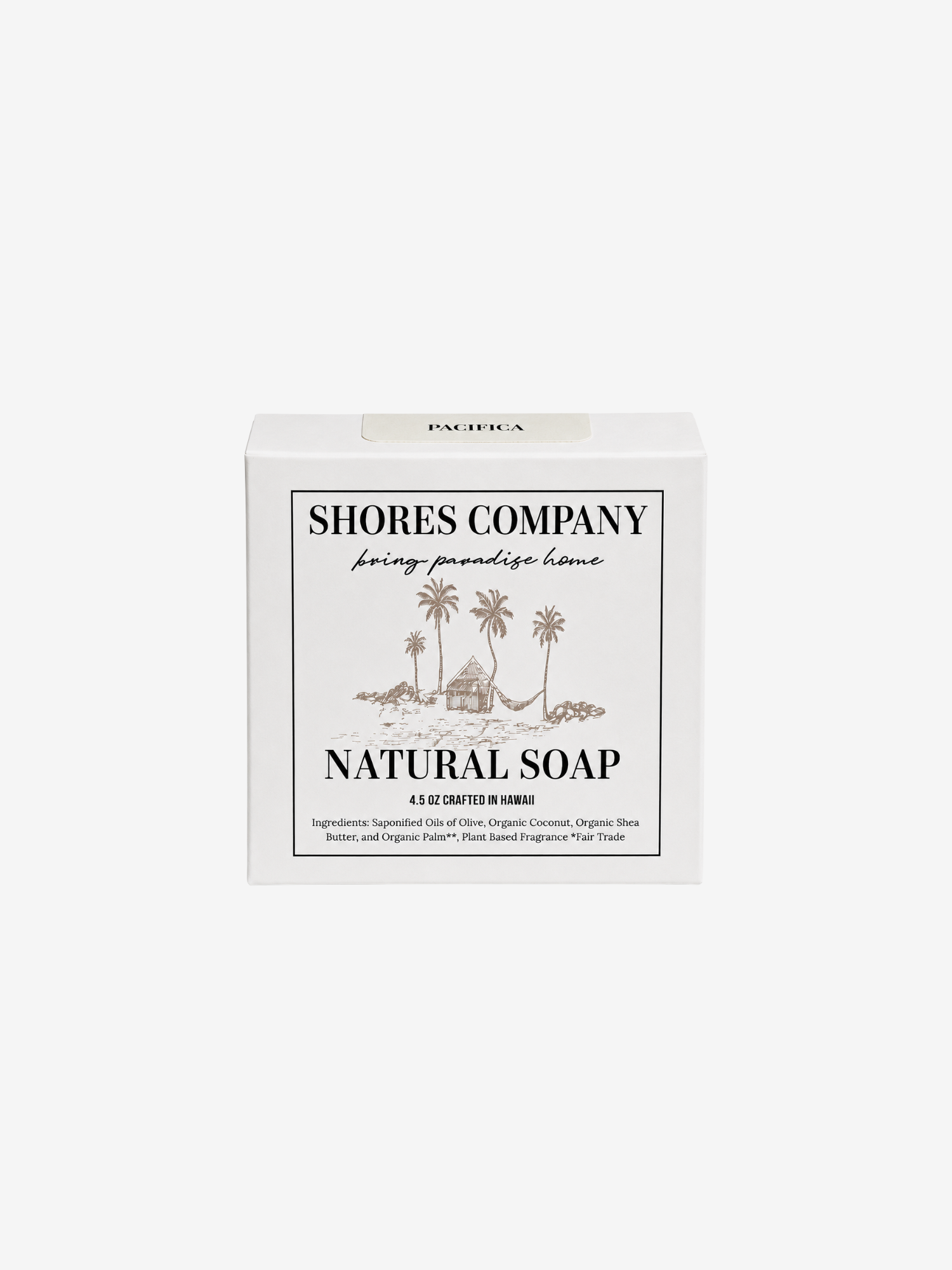A white rectangular box of Shores Company Natural Soap, featuring a minimalist black and brown tropical illustration of palm trees and a hut on the front label, set against a solid light gray background.