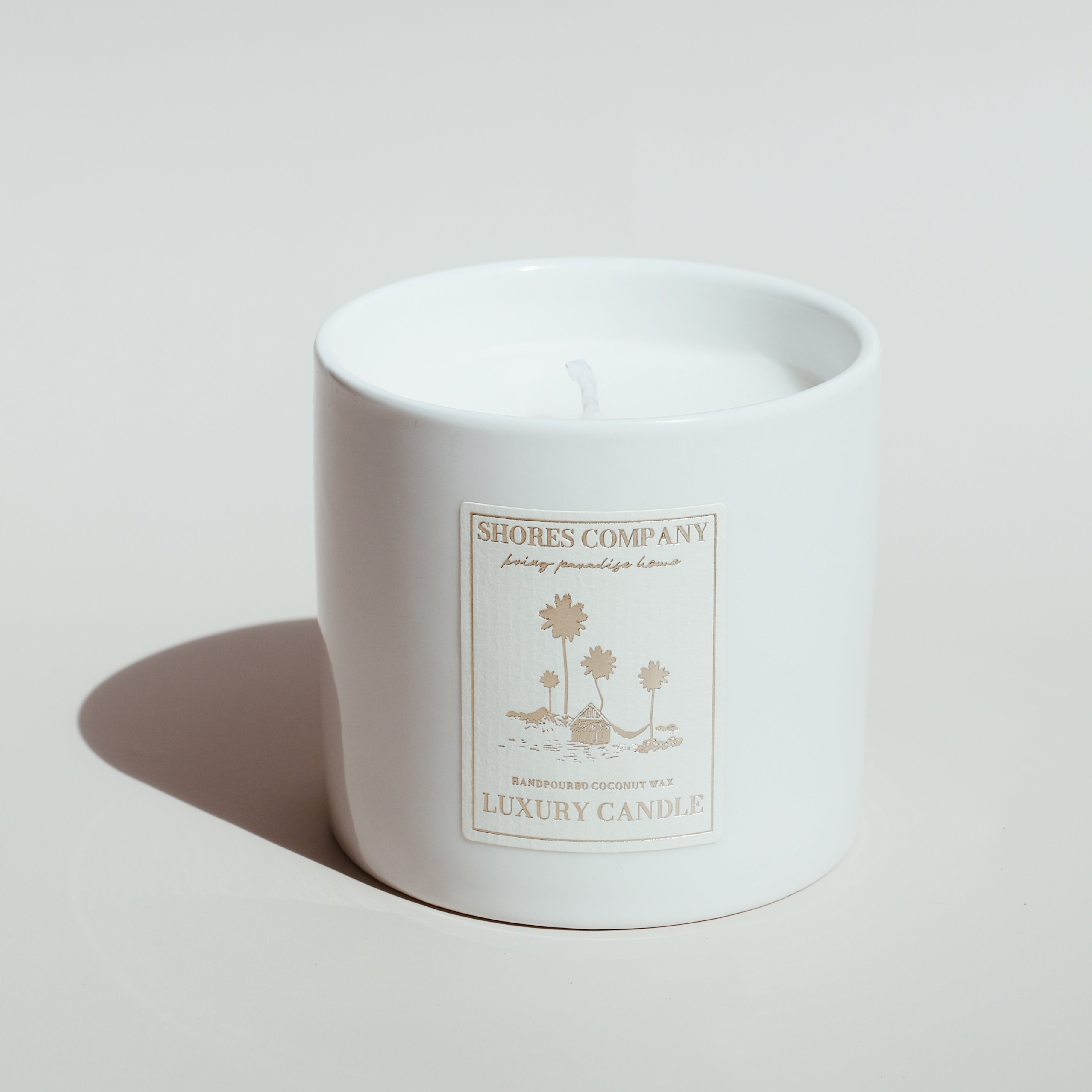 Shores Company 8oz luxury ceramic candle, crafted with clean-burning coconut wax for a tropical home ambiance.