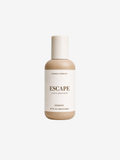 A bottle of SHORES COMPANY Escape Hand & Body Wash, Horizon scent, centered on a clean off-white background.