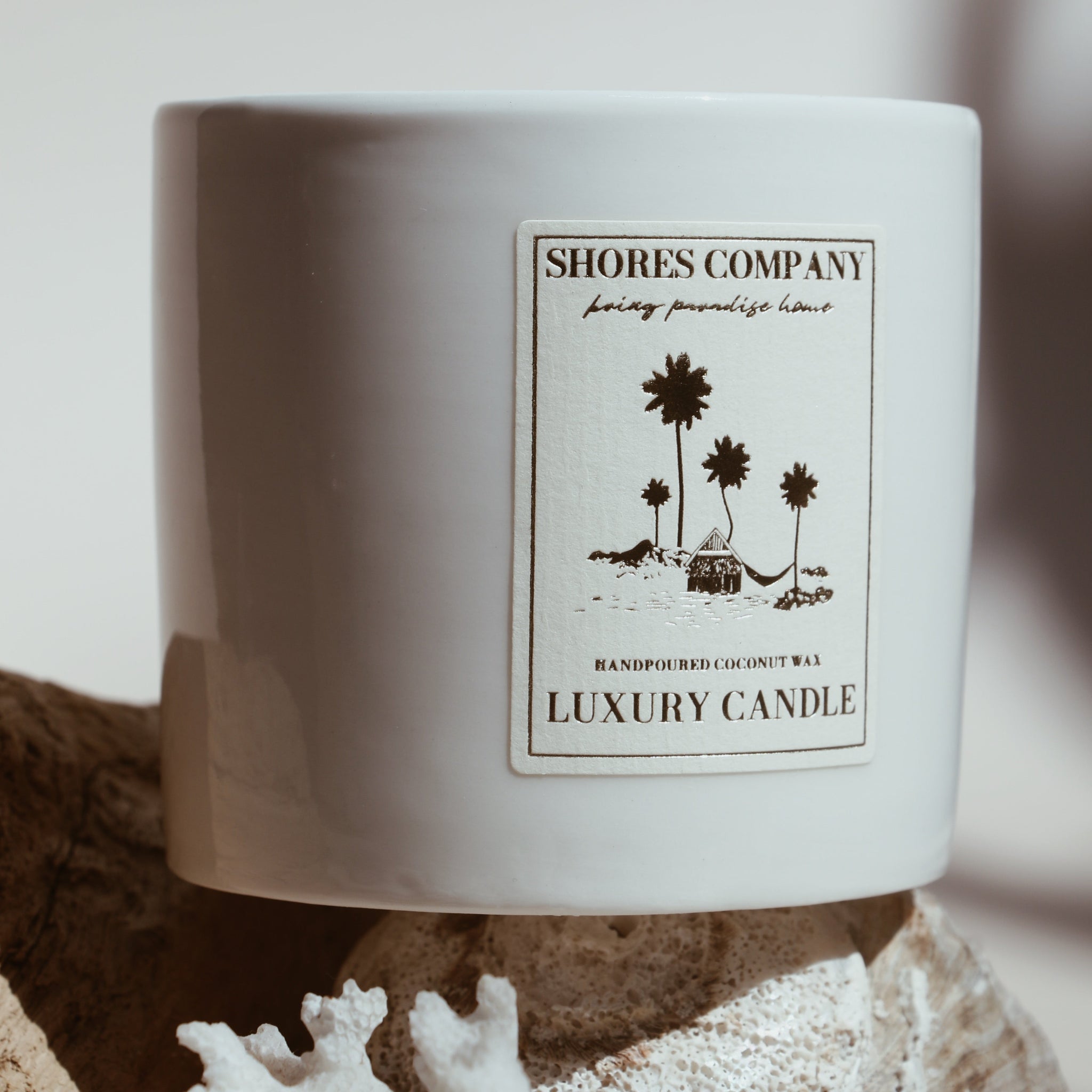 Shores Company hand-poured coconut wax candle in an elegant ceramic jar, designed for clean and long-lasting burning.