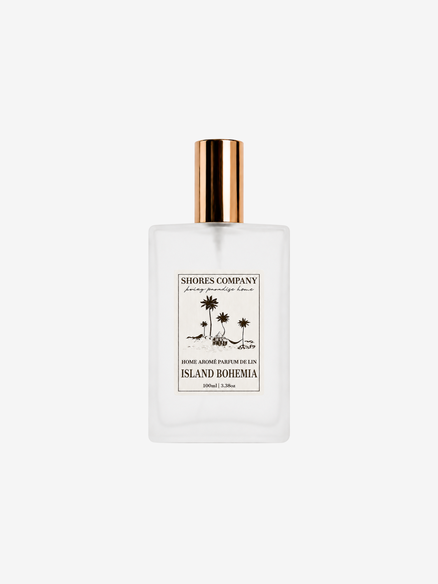 A frosted glass perfume bottle with a gold cap, featuring a white label with black text and palm tree illustrations. The brand 'Shores Company' is clearly visible on the label.