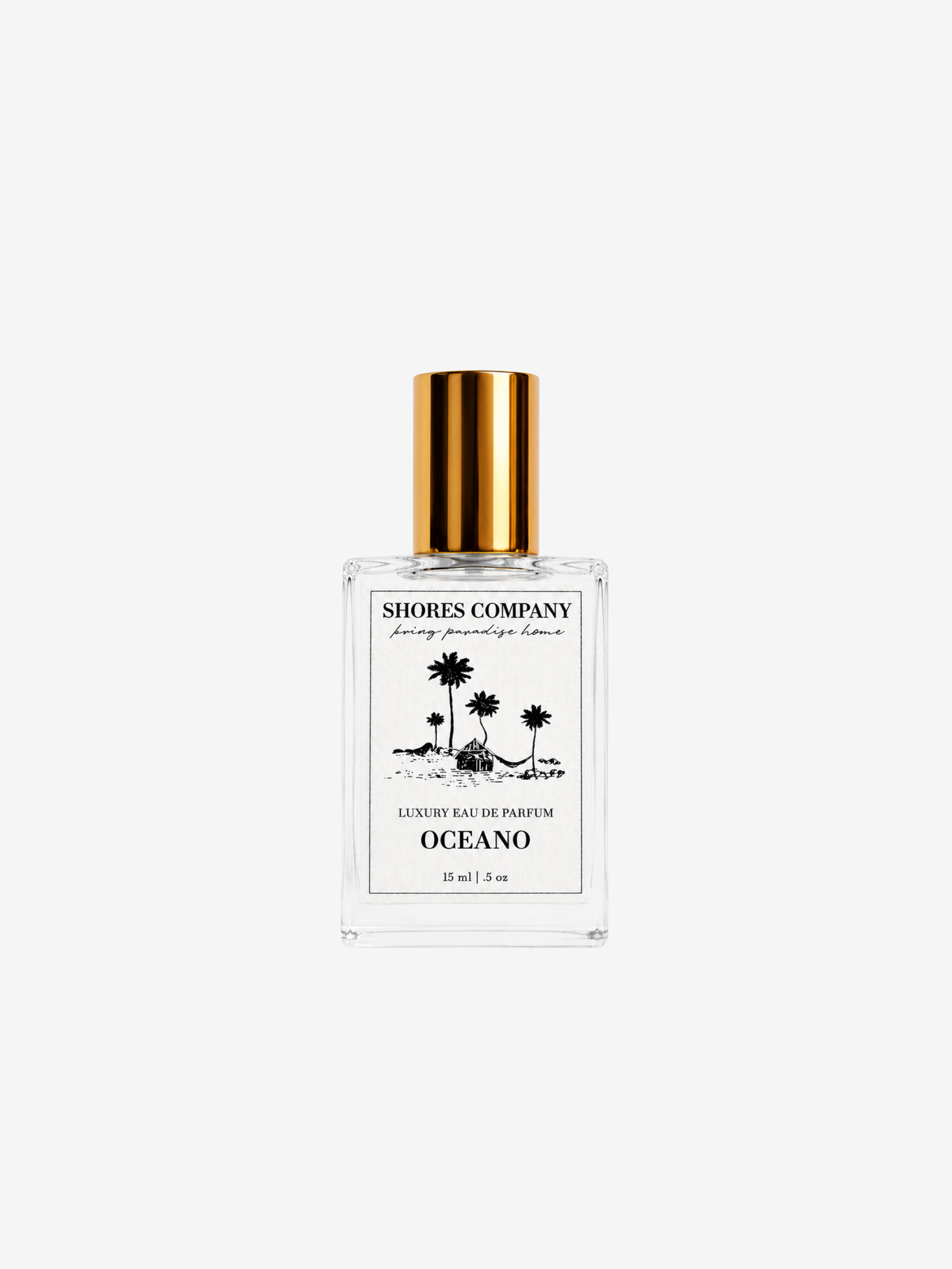 oceano eau de parfum mini roller with gold cap and luxury white label on white background